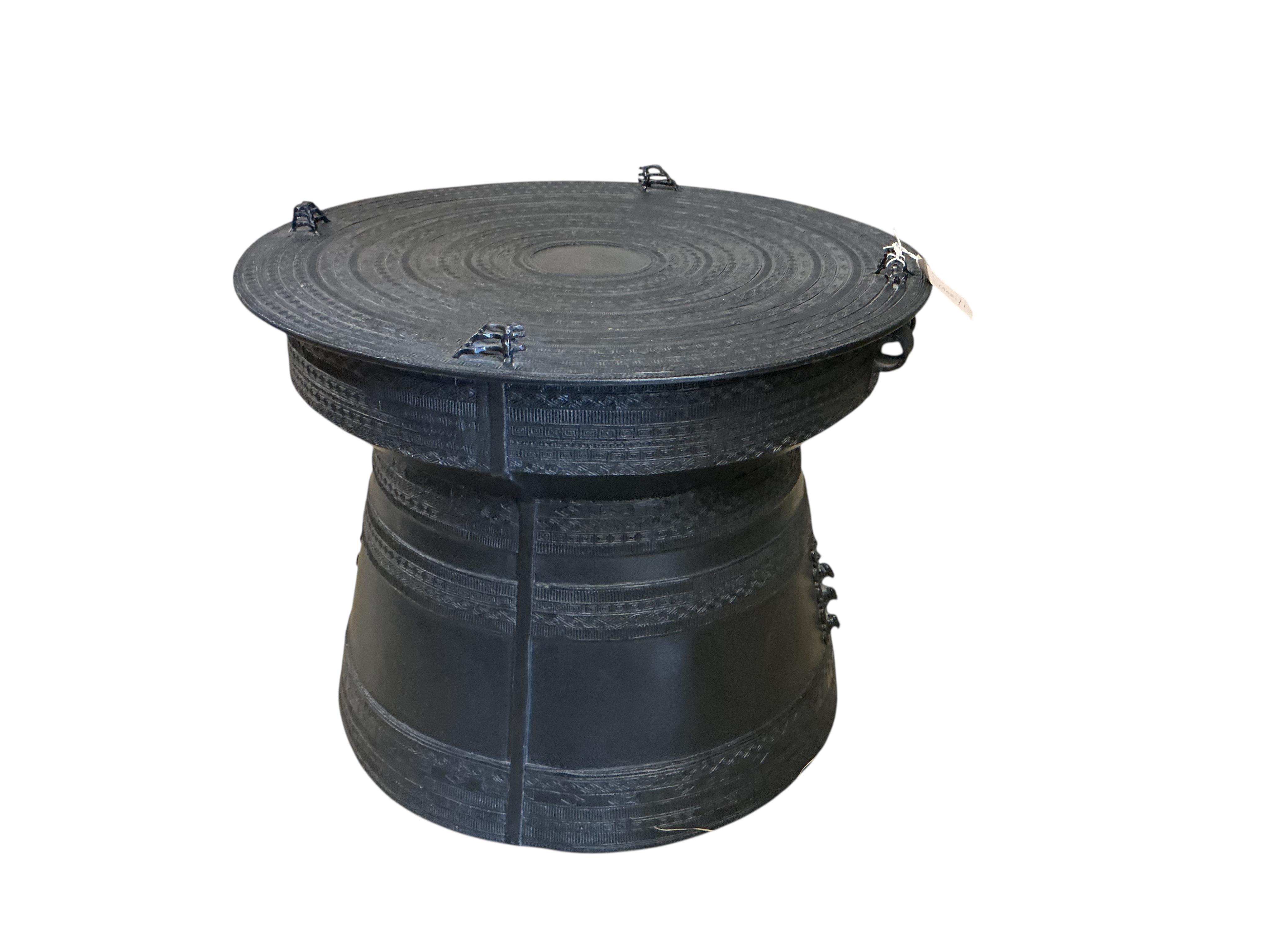 A South East Asian cast metal rain drum table, diameter 62cm, height 48cm